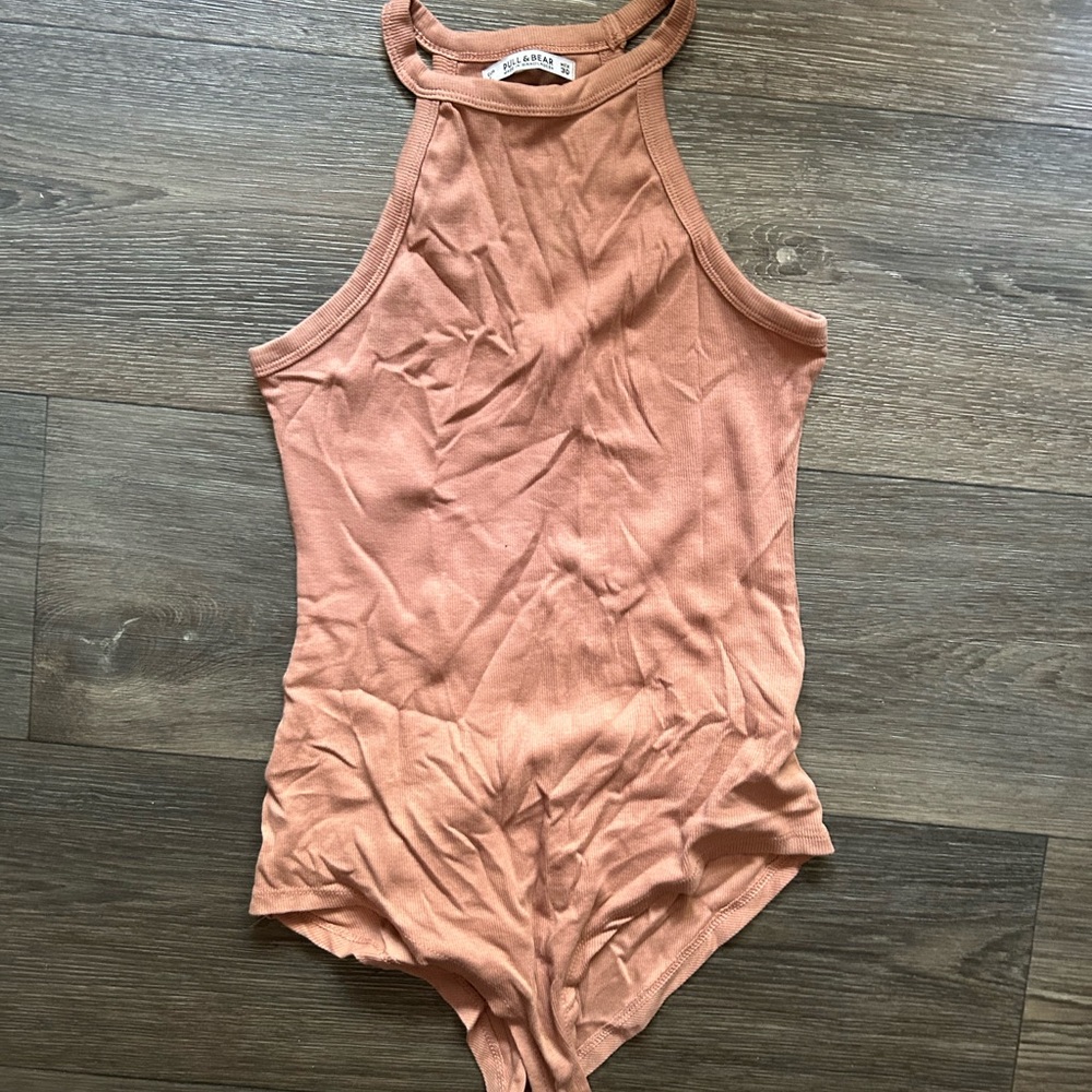 High neck , mauve bodysuit